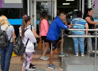 Cuáles son los requisitos para cobrar el 100% de la AUH